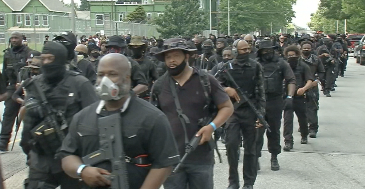 NFAC militia members march at a protest in Louisville on July 25, 2020