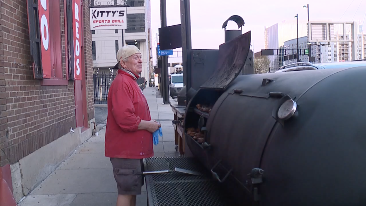 Billy Watson, co-owner of Kitty's Sports Grill on Third Street in downtown Cincinnati, smokes chicken wings, March 31, 2021.