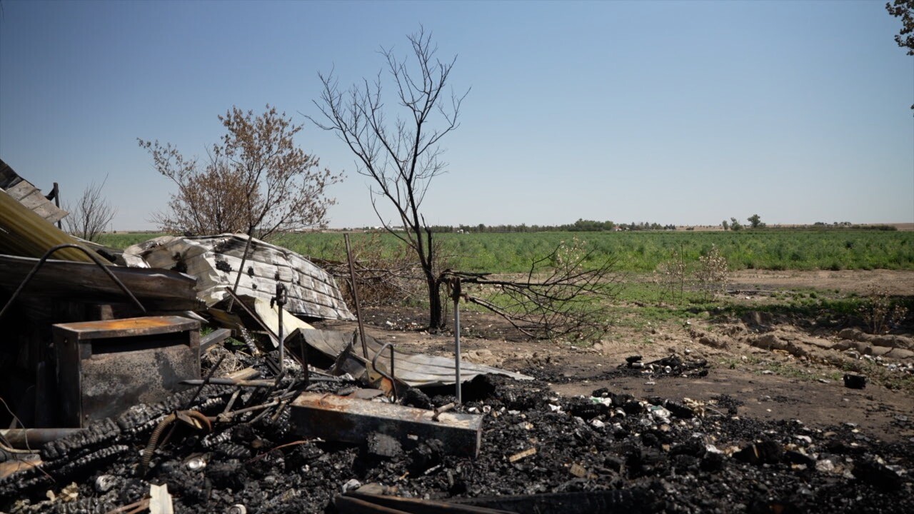 Fire with fields in background.jpg