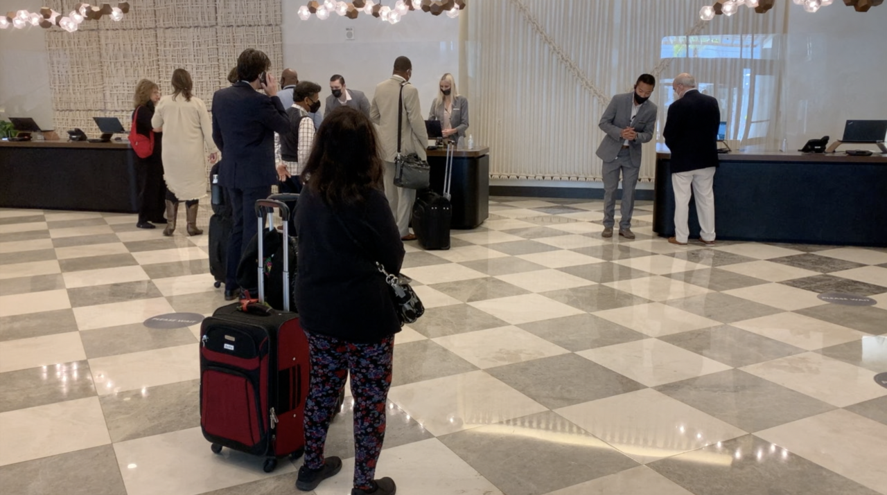 Hotel guests check in on 11/5/2021