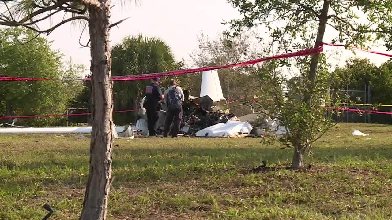 Investigator and Palm Beach County Fire Rescue inspect small plane wreckage at Palm Beach County Park Airport in Lantana, March 6, 2023