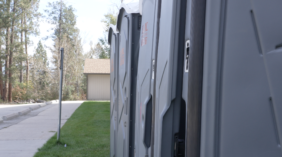 Porta-potties established outside of the gym ahead of the afterschool volleyball matches in case of need.