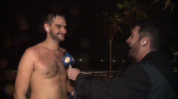 man running shirtless in rain
