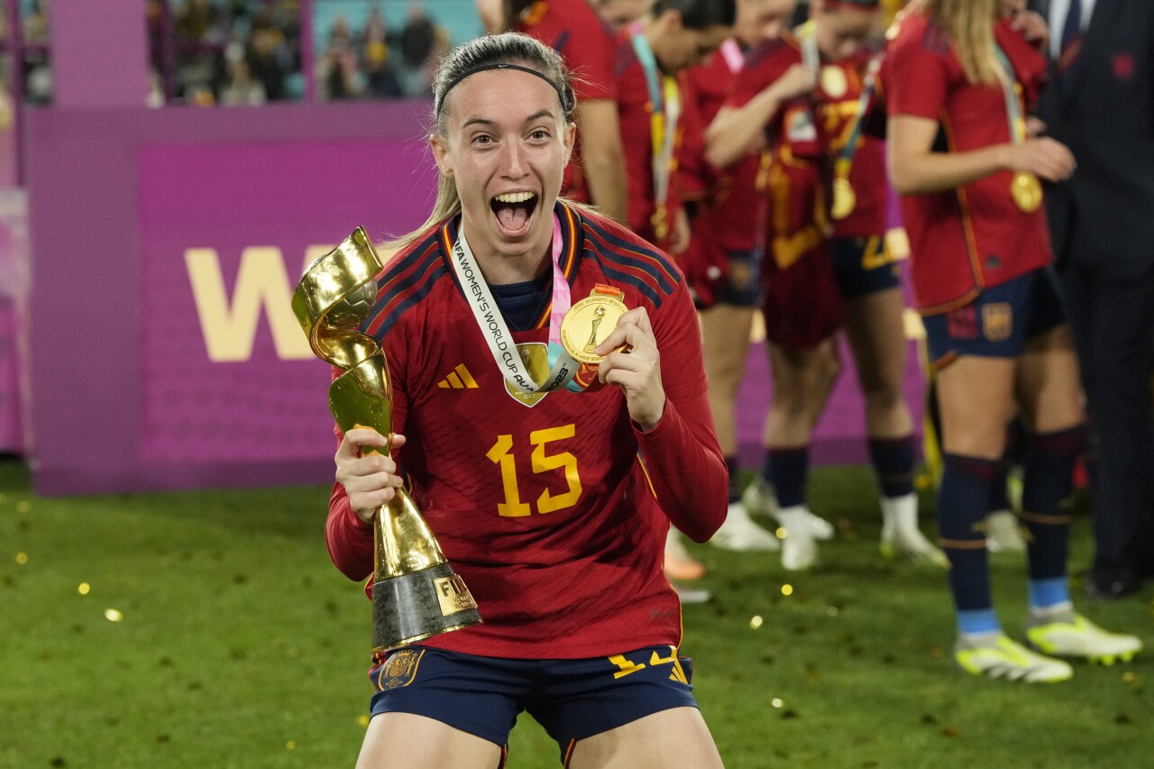Spain's Eva Navarro poses with the trophy after the final of Women's World Cup soccer between Spain and England at Stadium Australia in Sydney, Australia, Sunday, Aug. 20, 2023. (AP Photo/Rick Rycroft)