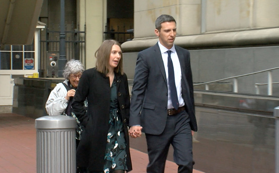 PG Sittenfeld and his family arrive at the federal courthouse on Dec. 5, 2022.