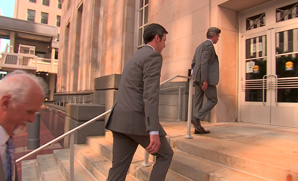 Former Cincinnati City Councilman PG Sittenfeld enters U.S. District Court in Cincinnati with attorneys Charlie H. Rittgers and Charlie M. Rittgers on June 1, 2022.