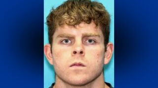 This mugshot shows Andrew James McGann, 28, of Springdale, Ark.