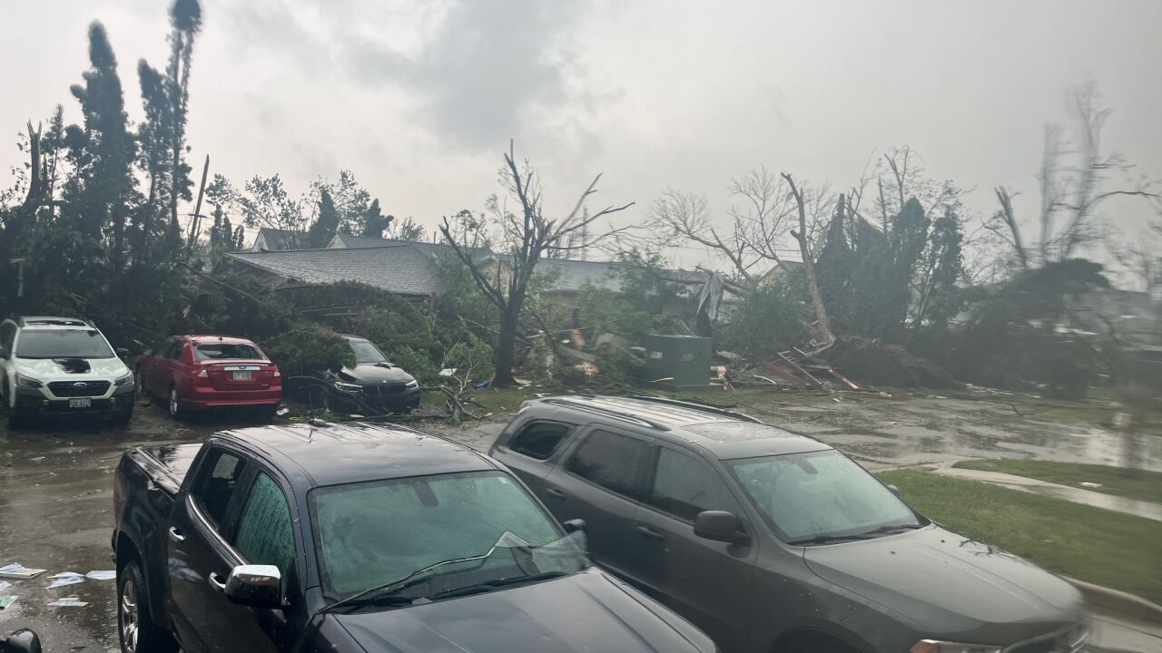 Strong winds damaged an office building on Fourth Street in Menasha Monday afternoon, blowing out windows, uprooting trees and scattering debris across the property.