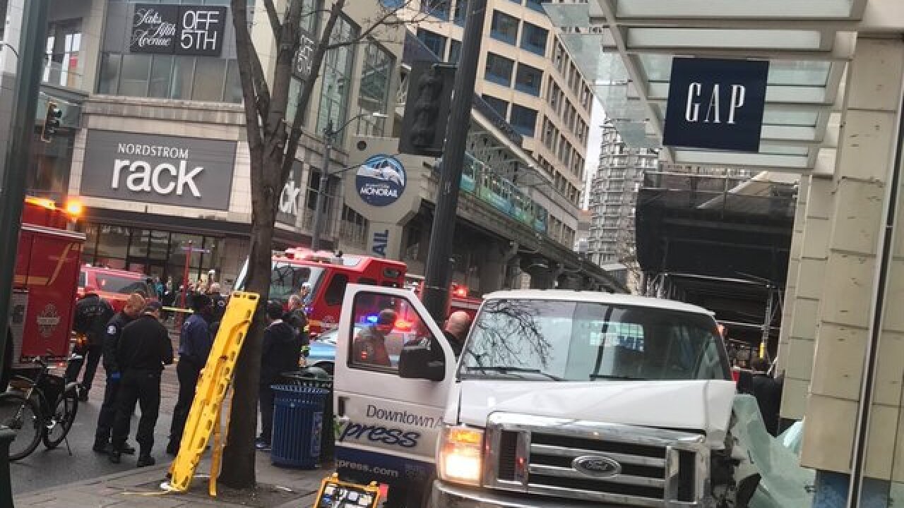Van drives into shoppers in downtown Seattle, at least four injured