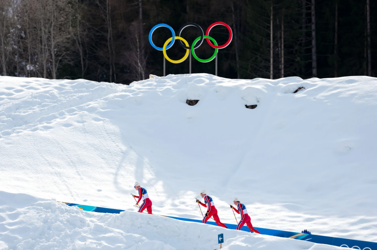 Martin Loewstroem Nyenget, of Norway, from left, Emil Iversen, of Norway, and Johannes Hoesflot Klaebo, of Norway, compete in the cross-country skiing men's 50km mass start Classic at the 2026 Winter Olympics, in Tesero, Italy, Saturday, Feb. 21, 2026.