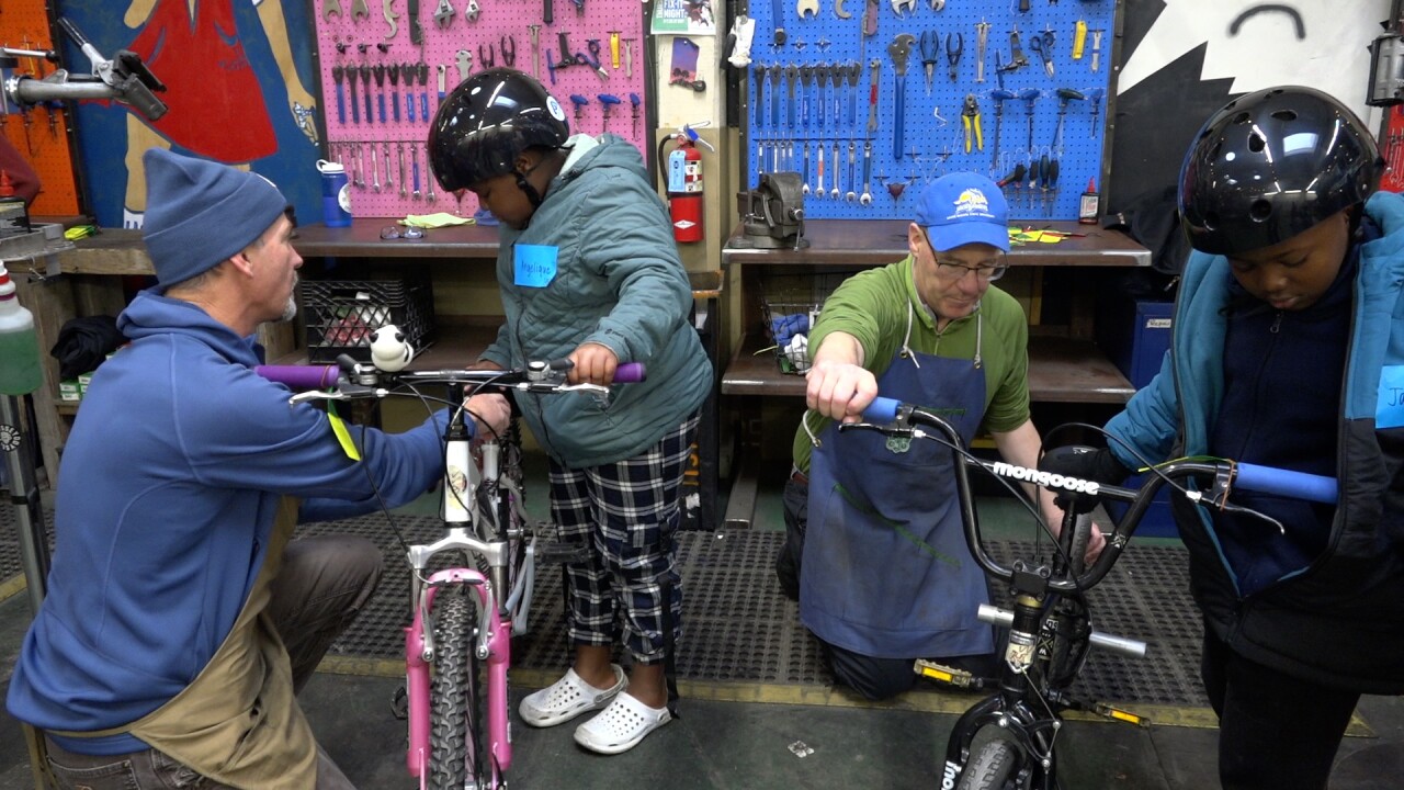 Volunteers get kids set up with their dream bikes