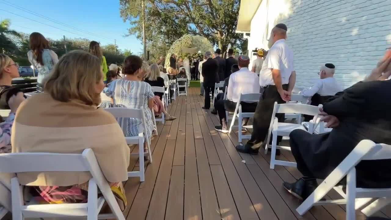 The wedding at Jewish Community Center in North Palm Beach was filled with friends of the family as well as strangers in the community who wanted to show their support.