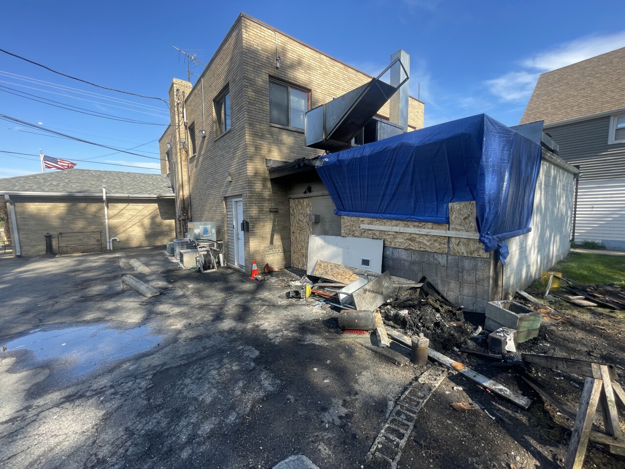 Firefighters responded around 3:45 a.m. to find flames on the outside of the building