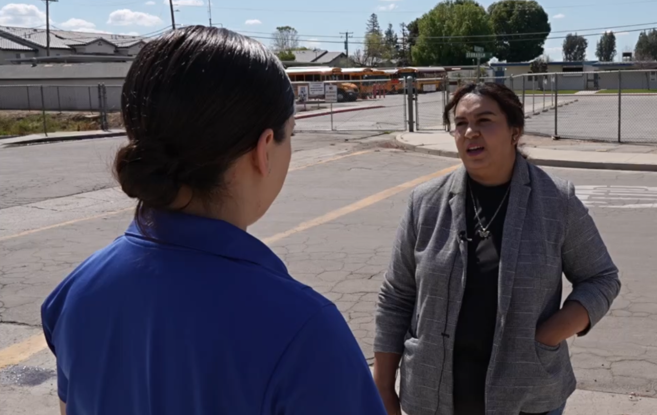 Neighborhood News Reporter Priscilla Lara interviewing Mirna Elbir, a mother who has child at LESD in Lamont