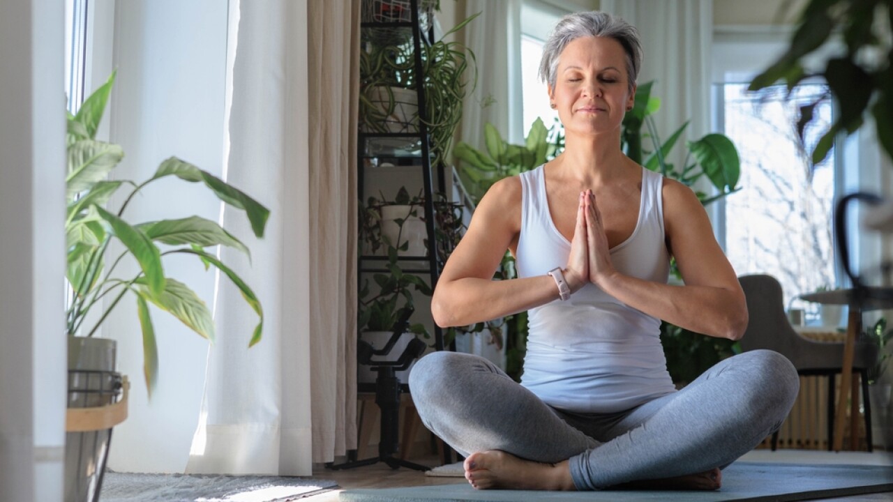 Beautiful,Smiling,Gray-haired,Mature,Middle-aged,Woman,At,Home,Sitting,On