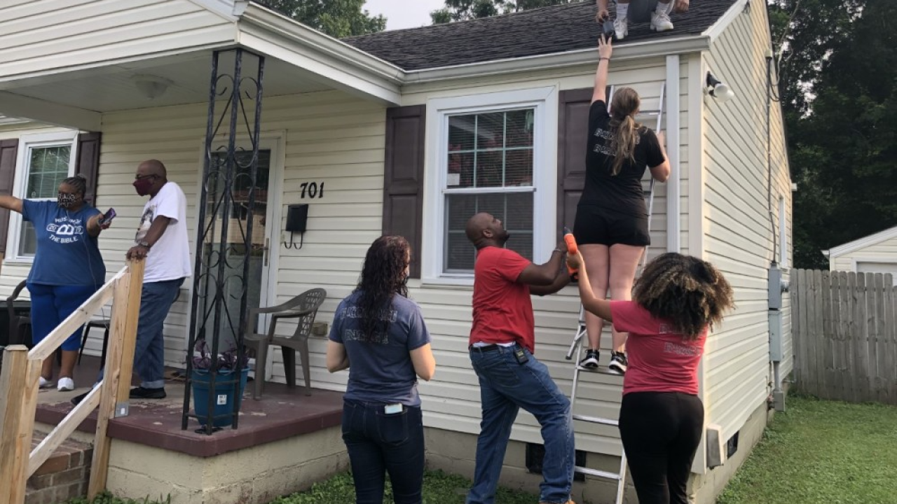 Local group installing solar-powered lights in neighborhoods to help combat crime