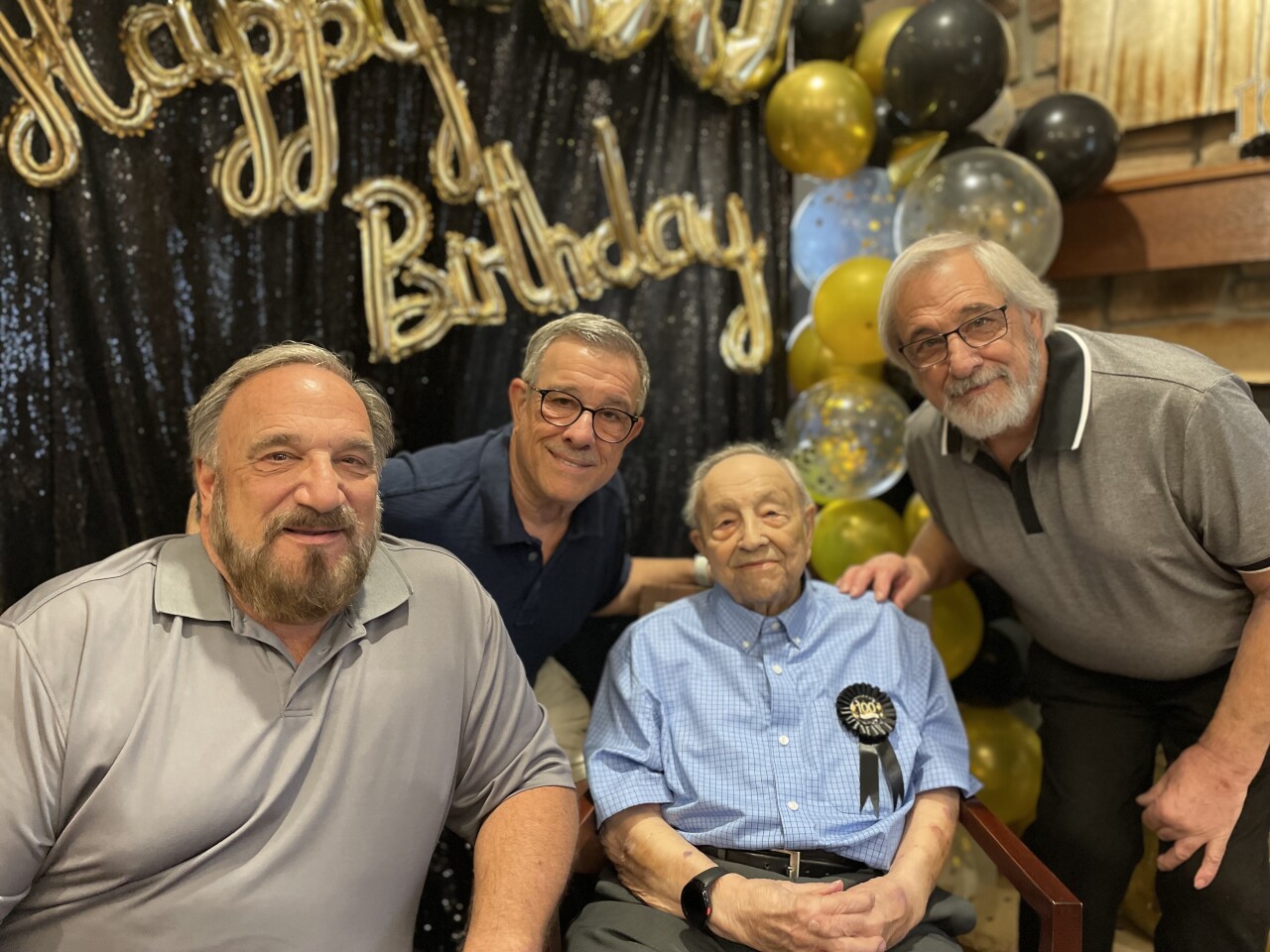 Photo of Tony Baudo with three sons