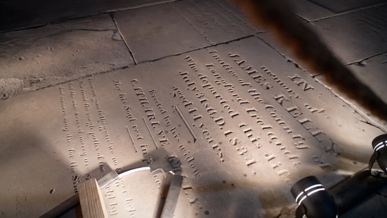 The tombstones on the floor of the burial crypt in the basement of St. Francis Seraph Catholic Church in Over-the-Rhine.