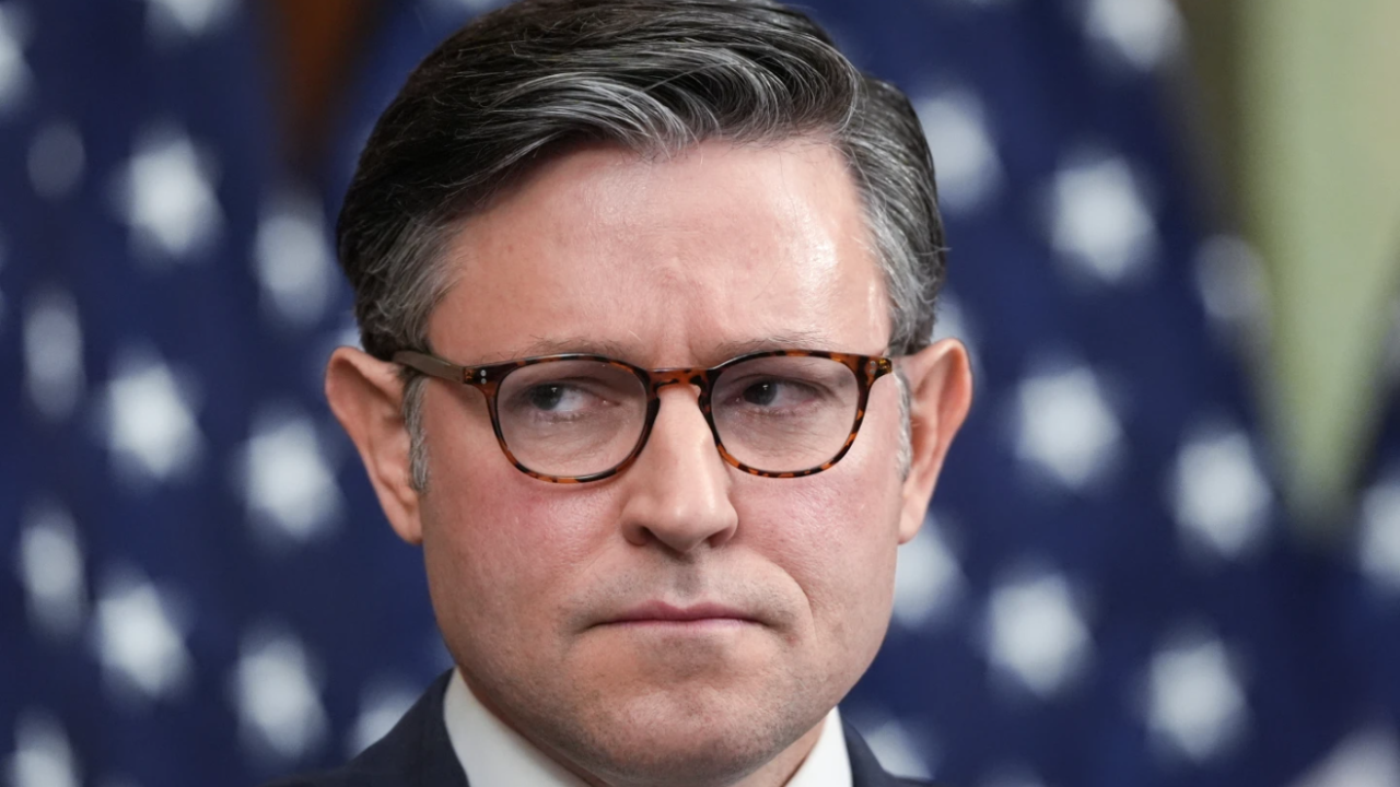 Speaker of the House Mike Johnson, R-La., listens to other GOP leaders as a government shutdown begins its tenth day in Washington, Friday, Oct. 10, 2025.