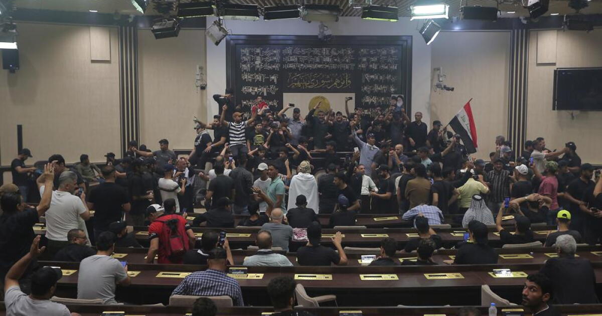 Iraq cleric’s followers camped out in parliament for 2nd day