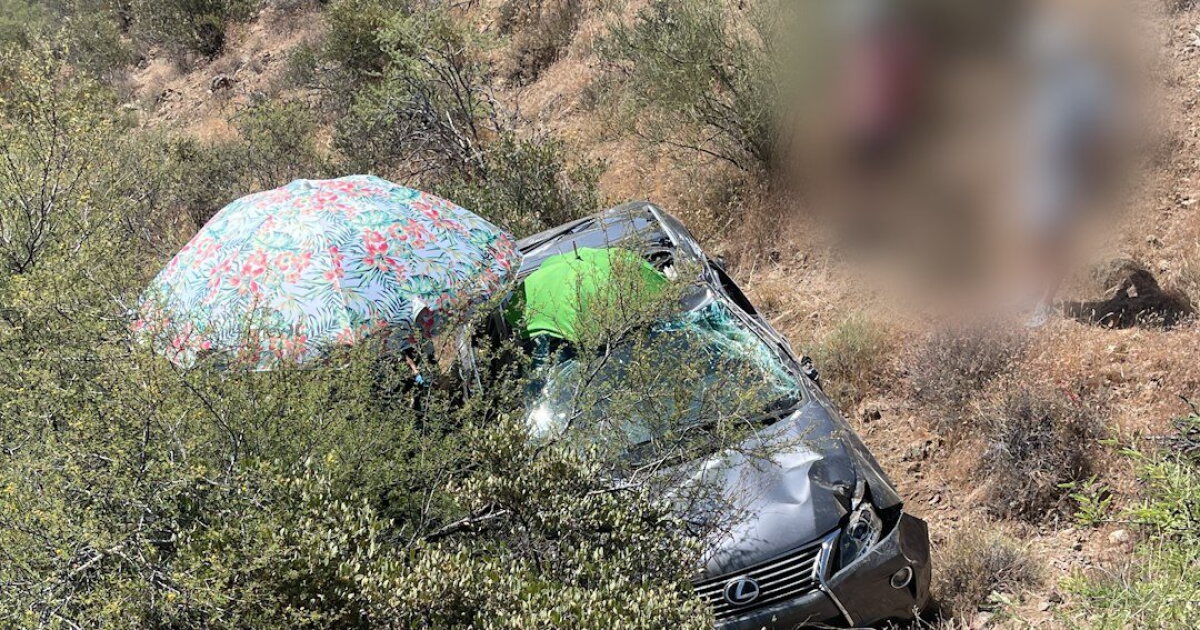Woman rescued after being trapped in crashed car for nearly 2 days
