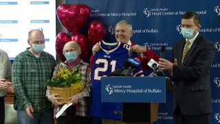 Alexander MacMillen and family with Bills jersey
