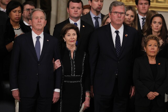 Photos: Mourners gather at the US Capitol to honor President George H.W. Bush