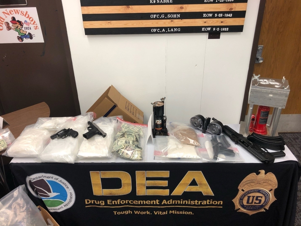 Drugs, guns and money seized during Lansing-area drug trafficking arrests