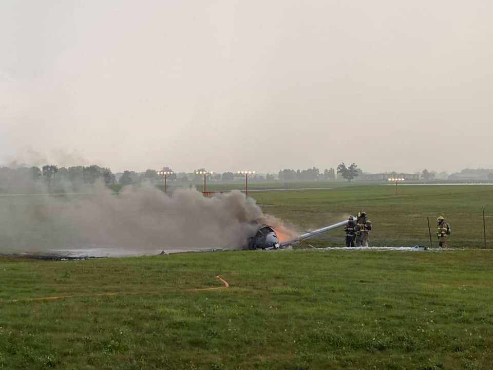 A small airplane on fire at Capital Region International Airport