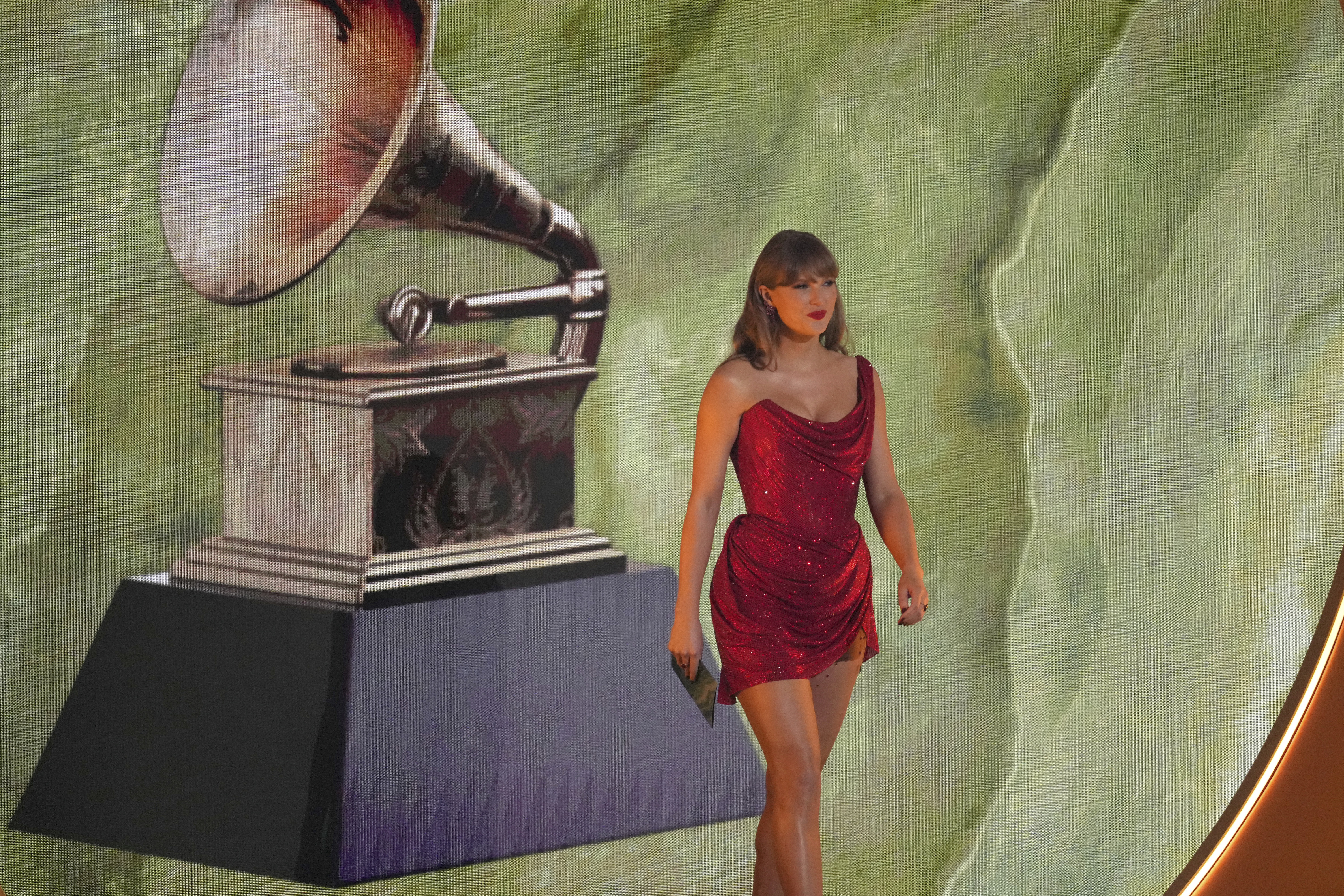 Taylor Swift presents the award for best country album during the 67th annual Grammy Awards on Sunday, Feb. 2, 2025, in Los Angeles.