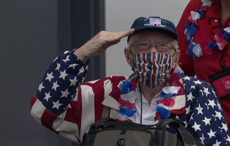 Salutes and smiles for local veterans on a trip to our nation's capital