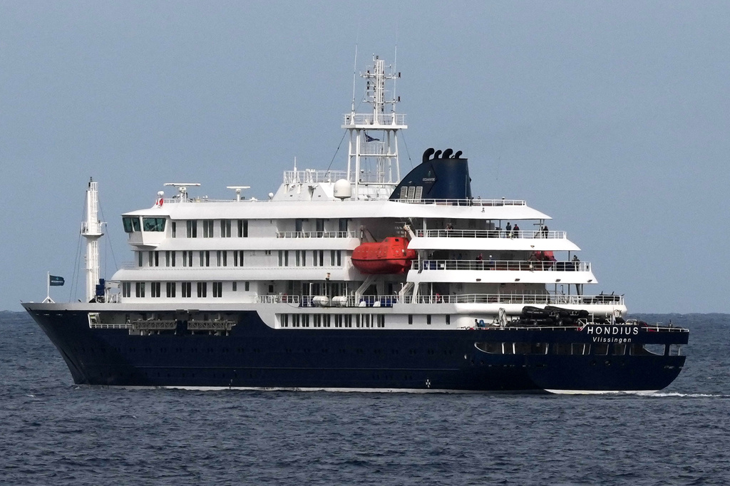 The MV Hondius cruise ship departs the port in Praia, Cape Verde, Wednesday, May 6, 2026.