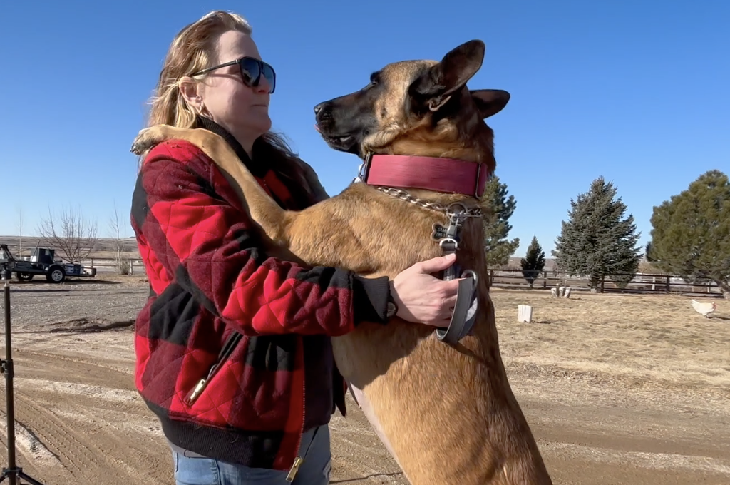 Danie Emerick is seen with her service dog Simeon on Friday, Feb. 28, 2025 in Shoshone, Idaho.
