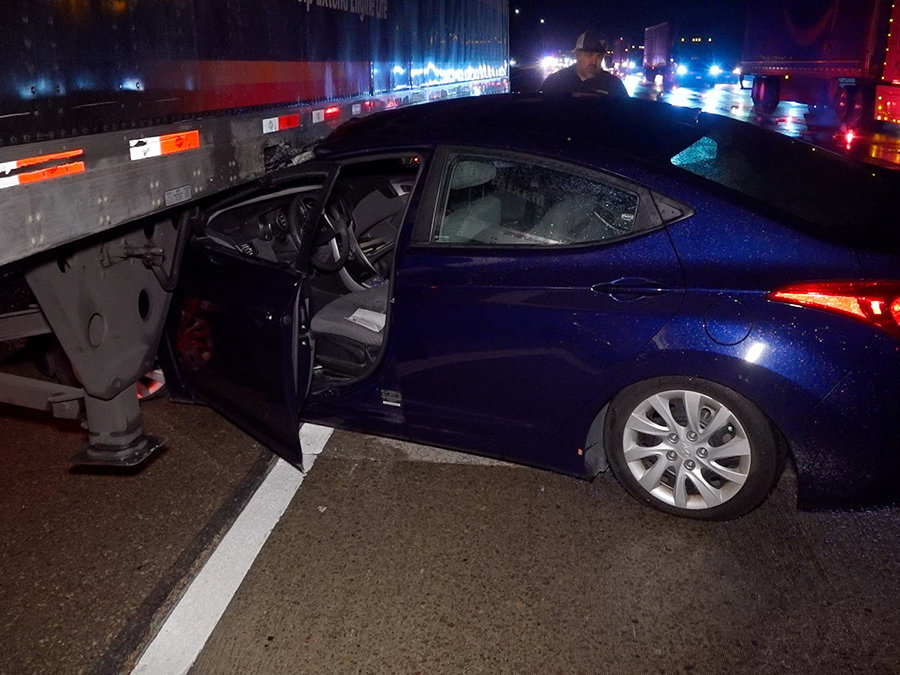 car_under_semi1_073123.jpg