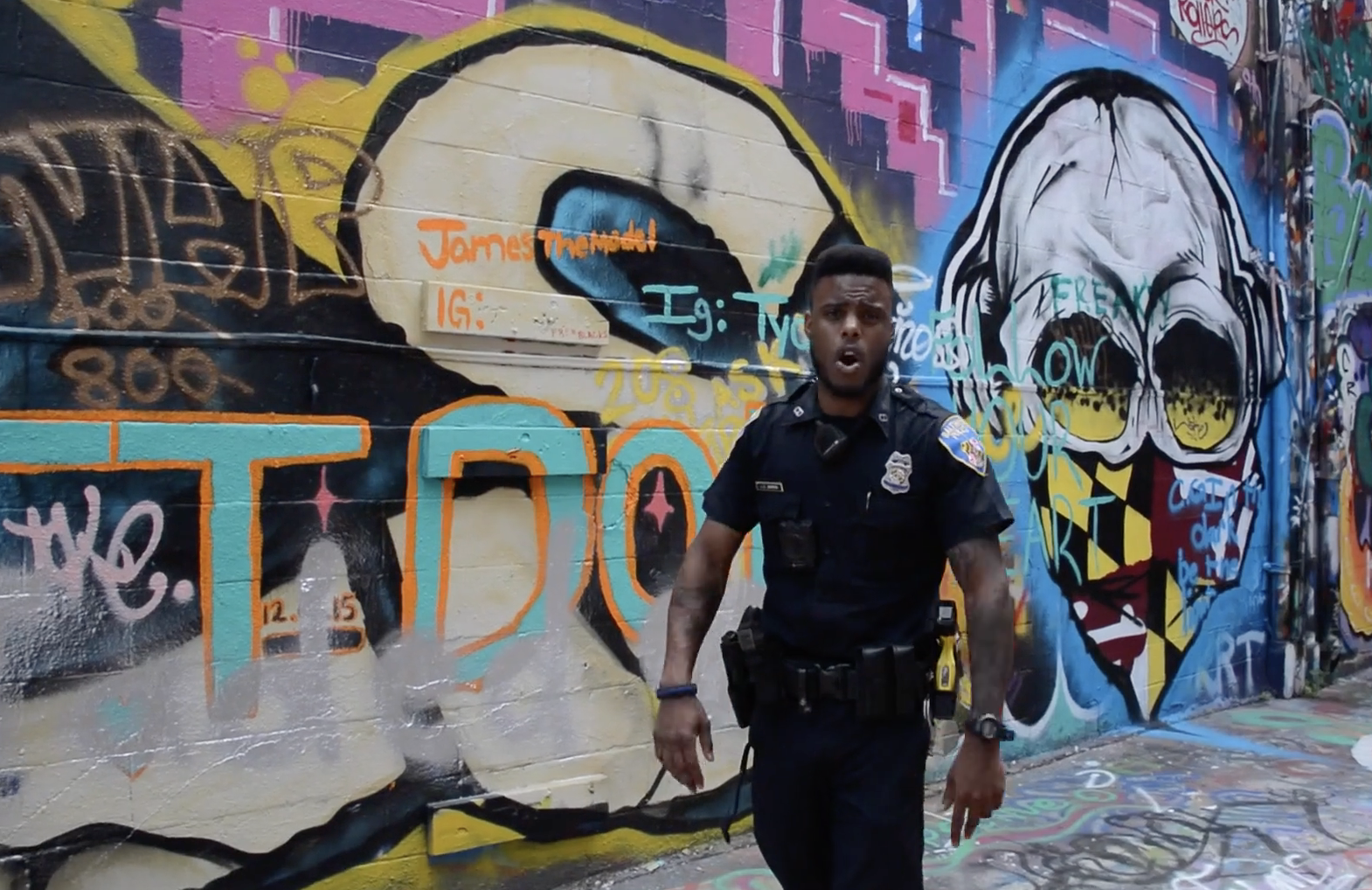 Officer Joshua Jackson, AKA "Saint the Rappin Cop"