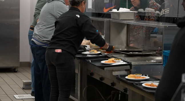 Meals being served Sunday evening inside the St. Anthony Center