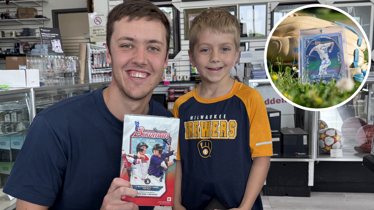 Jacob Misiorowski buys a pack of cards for a young fan