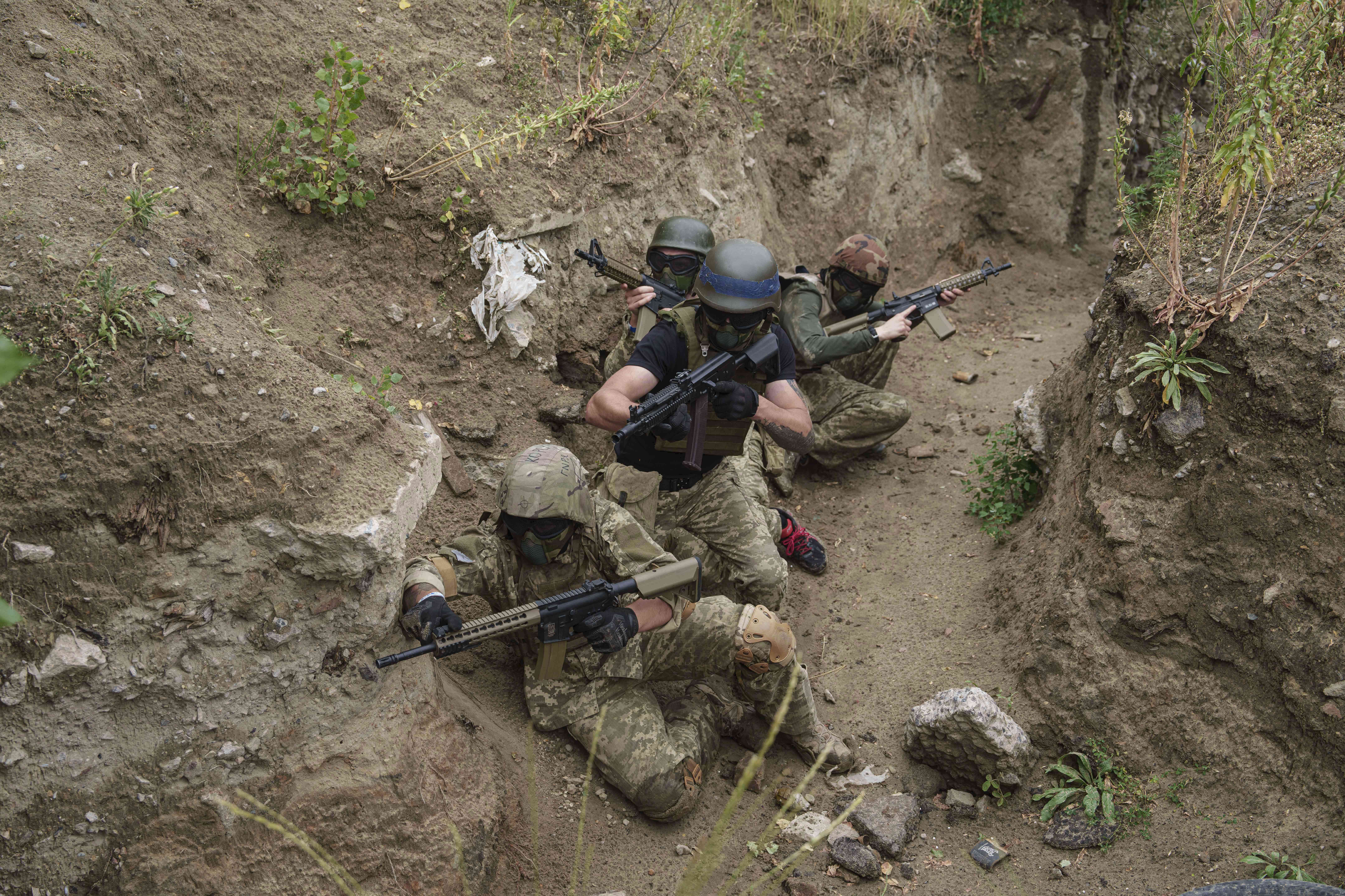 Ukrainian 3rd Assault Brigade recruits train at the polygon in Kyiv region, Ukraine, on Wednesday, July 16, 2025.