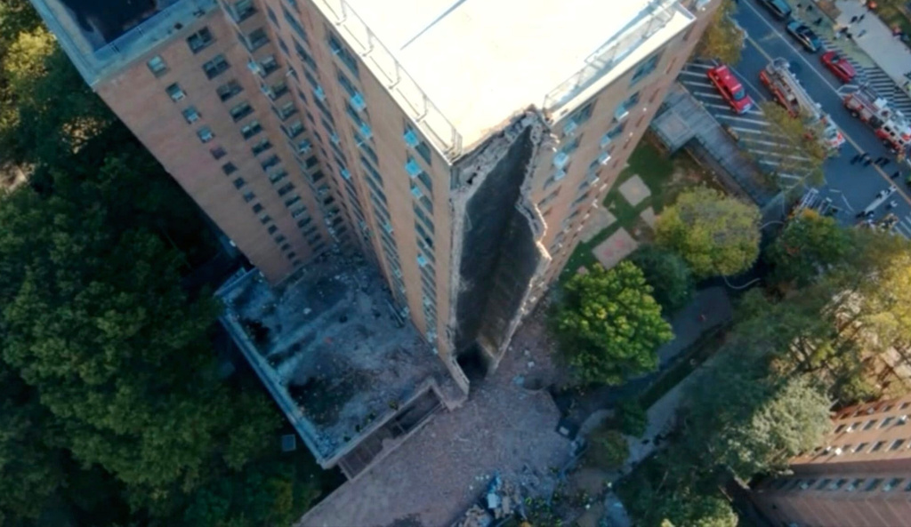 This image provided by the Fire Department of New York, FDNY shows part of a high-rise apartment building that collapsed, leaving a corner of the building in a pile of rubble, in New York, Wednesday, Oct. 1, 2025. 