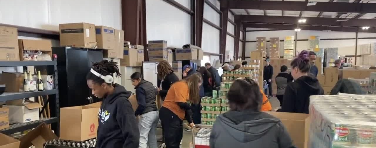 CSUB volunteers boxing up donations from the 23ABC Senior Food Drive