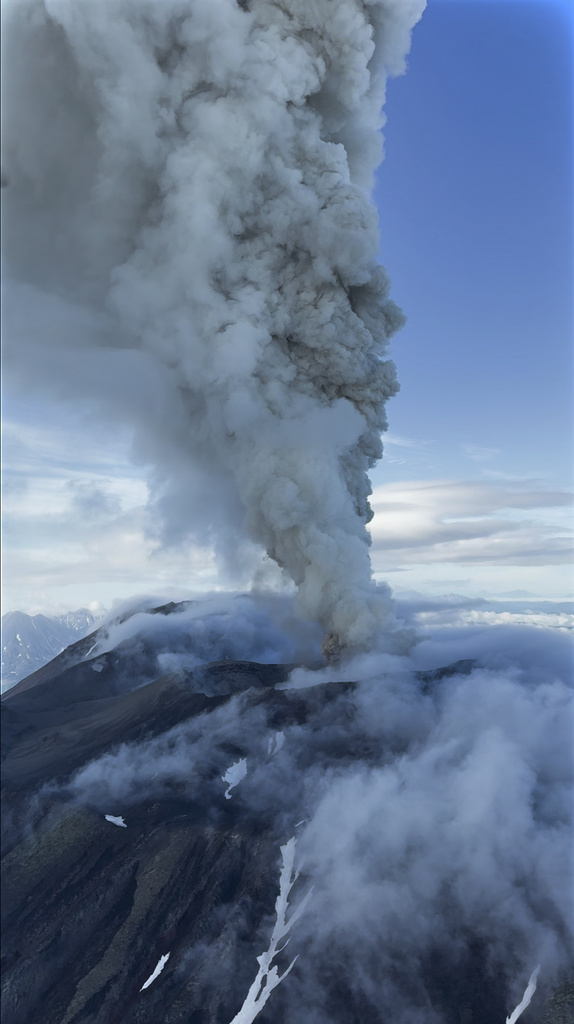 This photo taken from video by Artem Sheldr shows an aerial view of the eruption of the Krasheninnikov volcano of the Eastern volcanic belt, about 125 miles northeast of the regional center of Petropavlovsk-Kamchatsky, Russia.