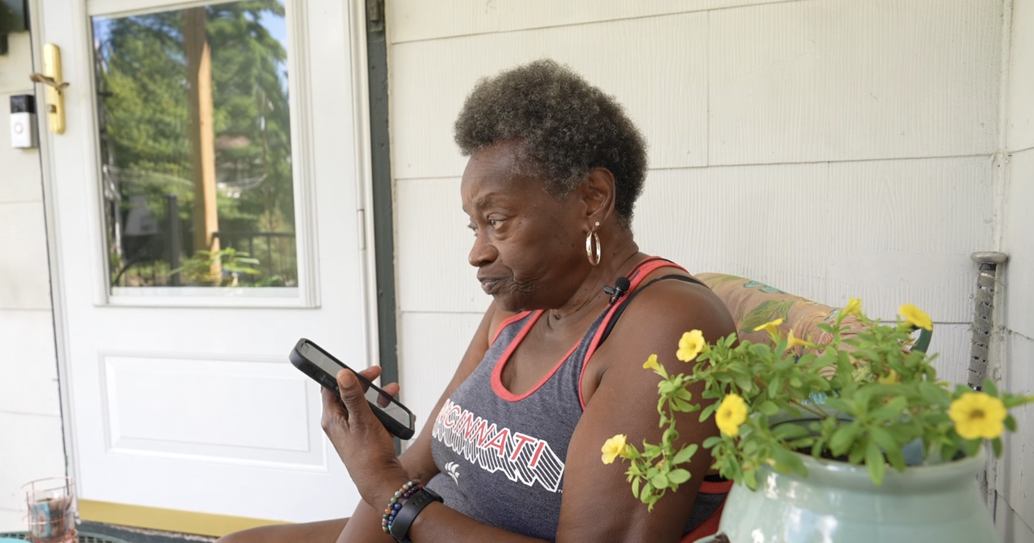 A woman gets a scam call. 