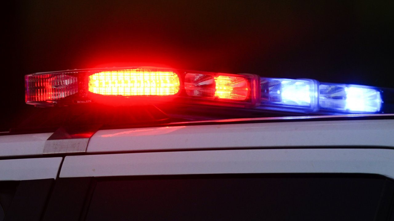 Police lights are shown.