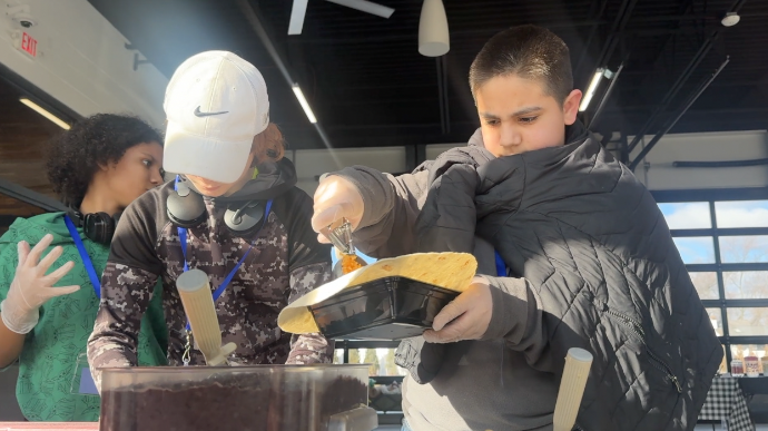 Students making burritos
