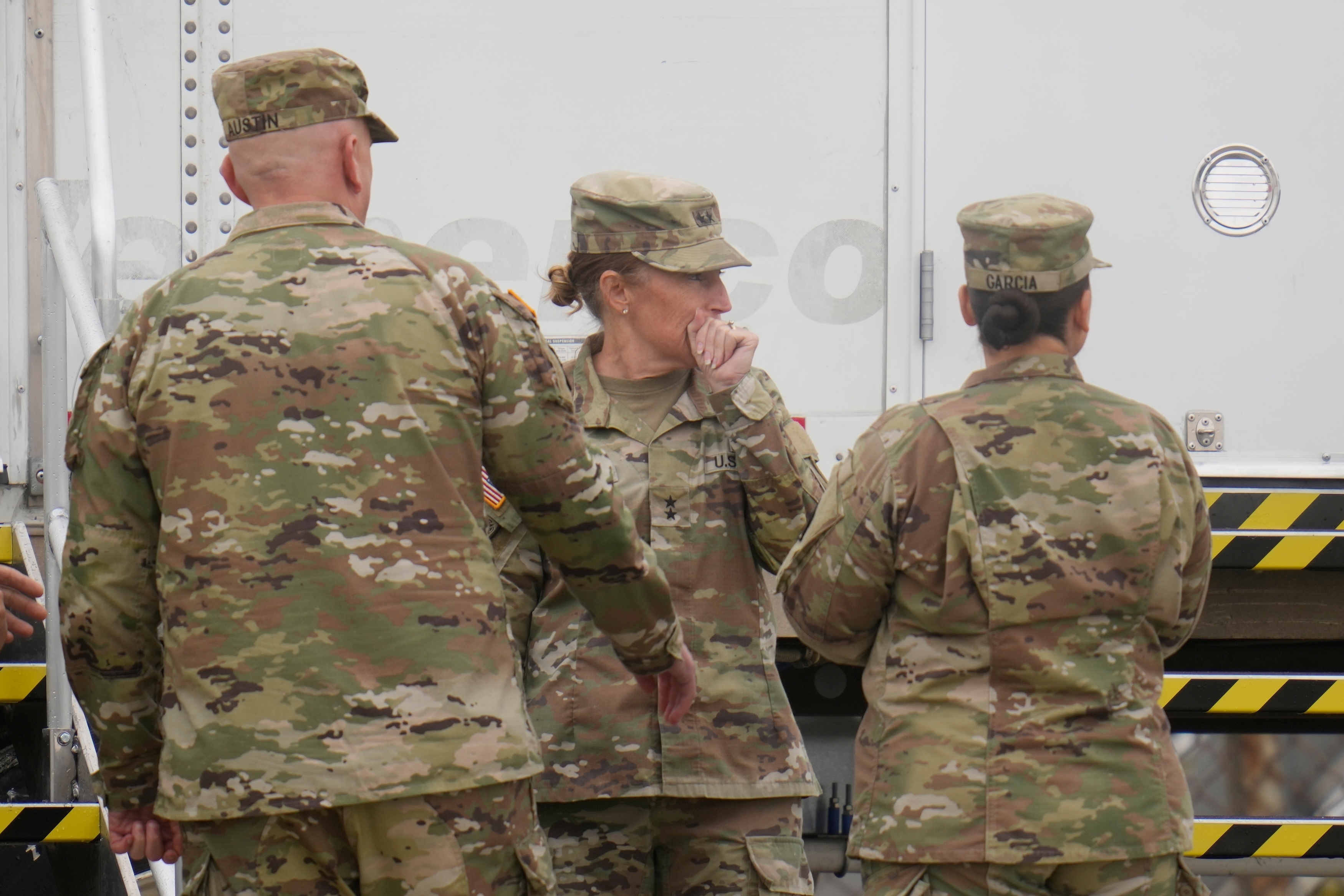 Maj. Gen. Niave F. Knell, deputy commanding general for operations at United States Army North, center, is seen at the U.S. Army Reserve Center, Tuesday, Oct. 7, 2025, in Elwood, Ill., a suburb of Chicago.