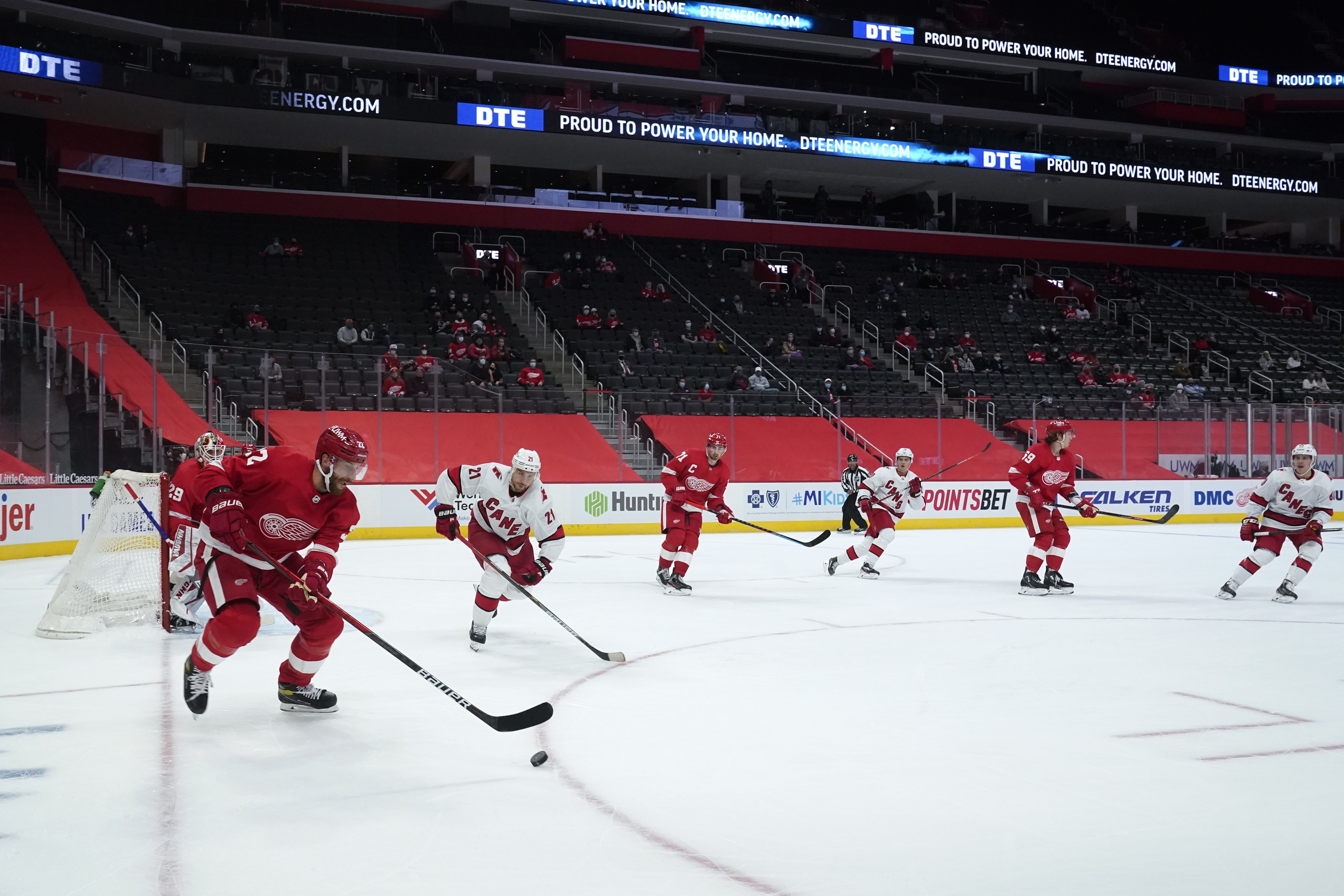 Opening Night limited crowd Little Caesars Arena Hurricanes Red Wings Hockey
