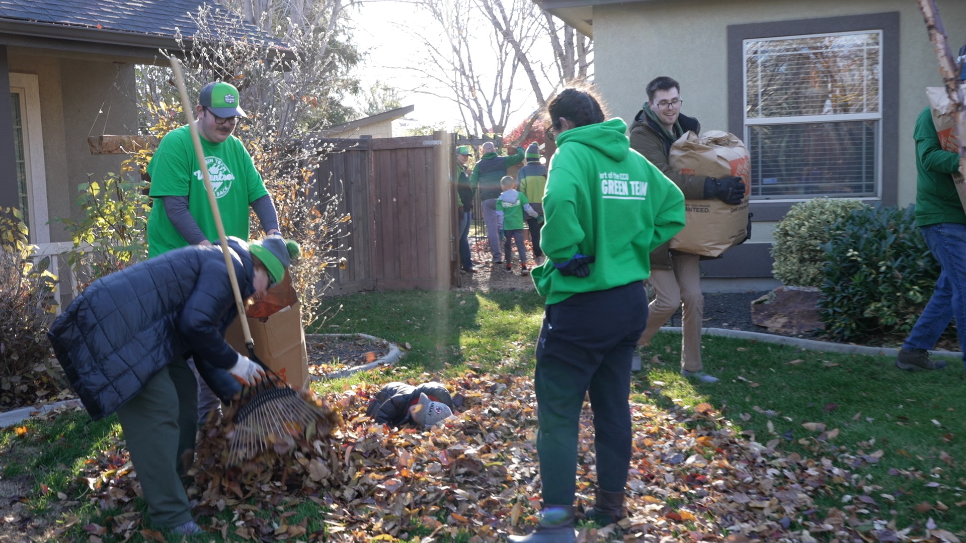 VOLUNTEERS RAKE UP MERIDIAN .jpg