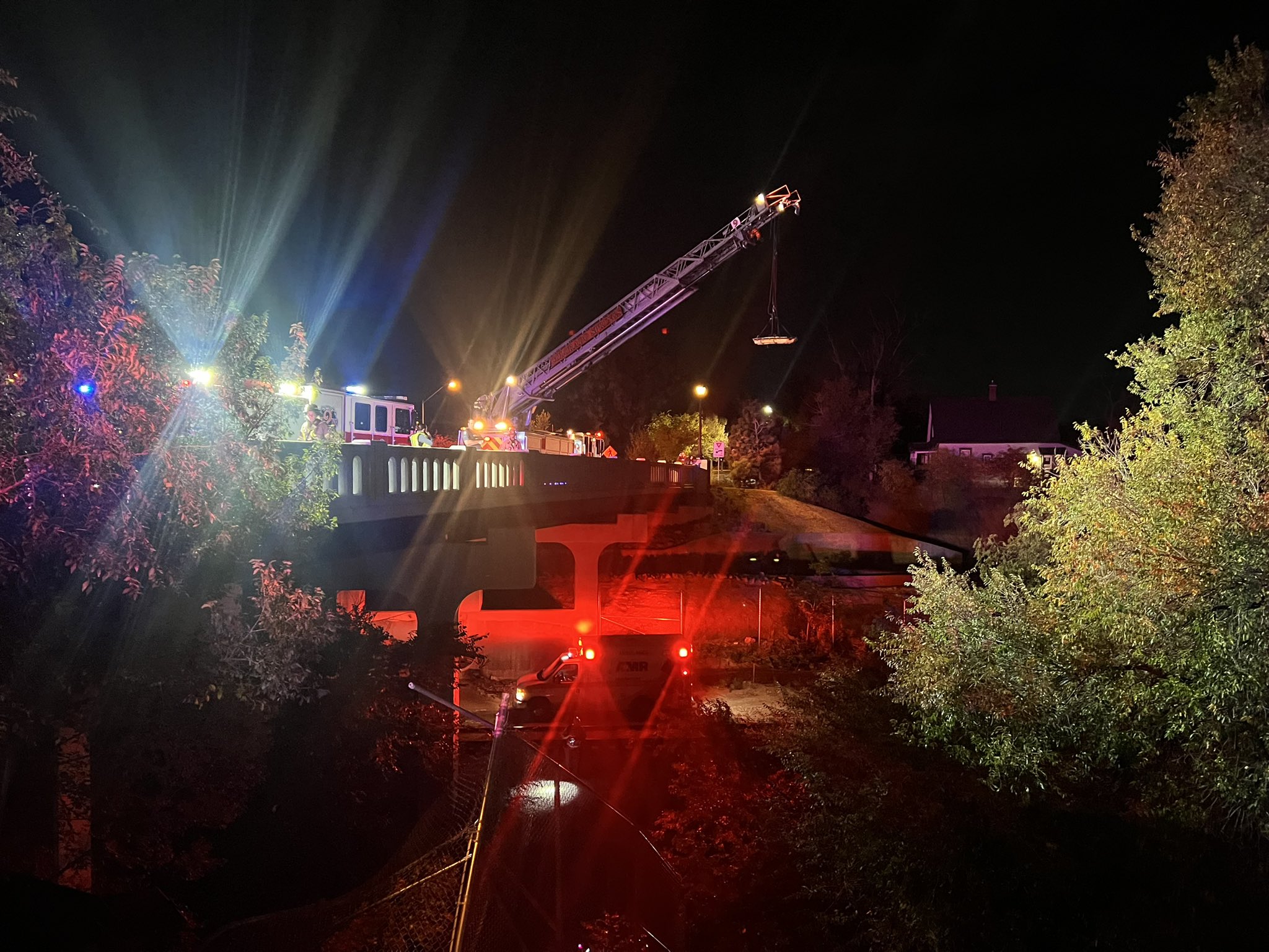 Man crashes car off of North Nevada bridge