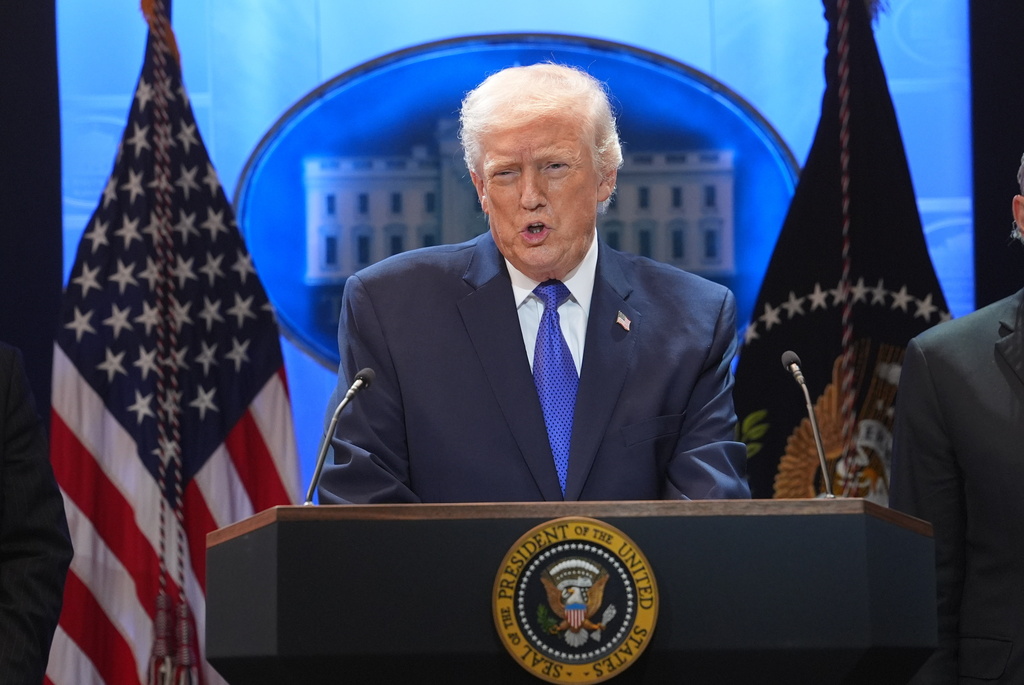 President Donald Trump speaks during a press briefing at the White House, Friday, Feb. 20, 2026, in Washington. 