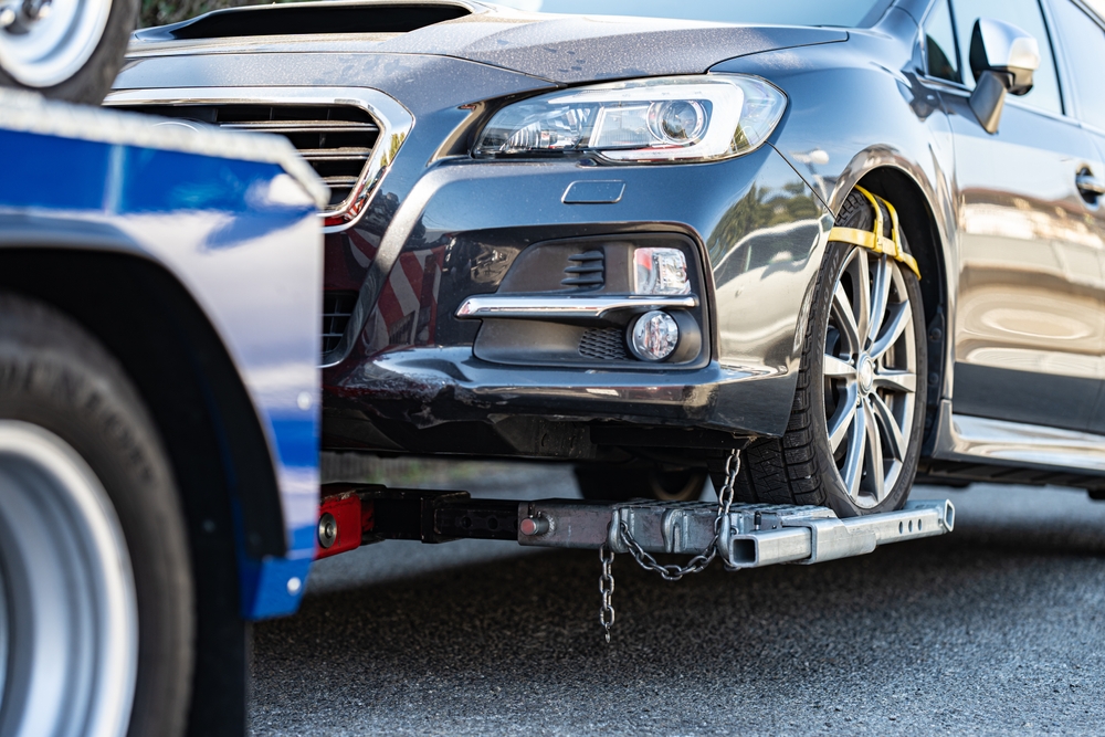 Stock image of a vehicle being towed.
